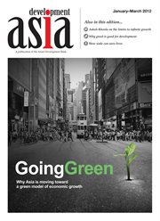 Development Asia. Going green cover image