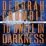To dwell in darkness: a novel cover image