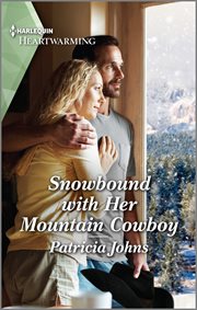 Snowbound with her mountain cowboy cover image