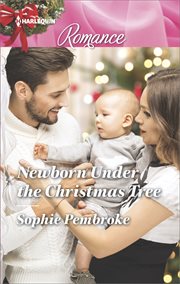 Newborn under the Christmas tree cover image