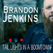 Tail lights in a boomtown cover image