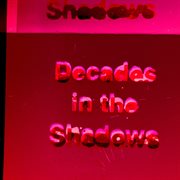 Decades in the shadows cover image