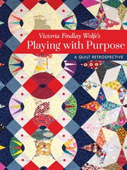 Playing with purpose : a quilt retrospective cover image