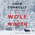 The wolf in winter cover image
