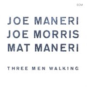 Three men walking cover image