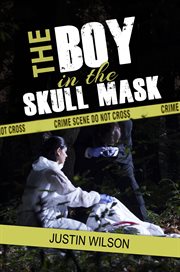 The boy in the skull mask cover image