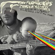 The flaming lips and stardeath and white dwarfs with henry rollins and peaches doing dark side of th cover image