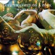 Love smashed on a rock cover image