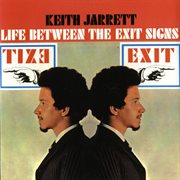 Life between the exit signs cover image