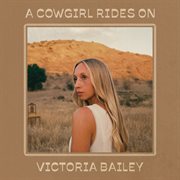 A cowgirl rides on cover image